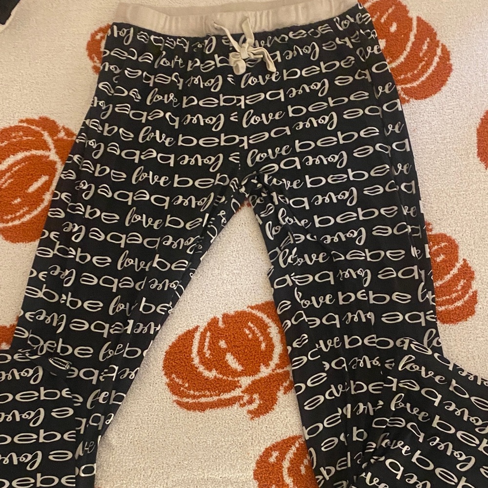 Bebe Black and White Script Print Pants